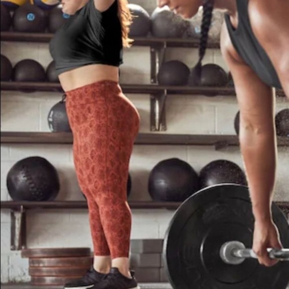 Athleta Ultimate Snake 7/8 tight (Stash pockets) 1x
